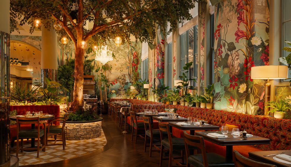 The interior of The Ivy Liverpool restaurant featuring ornate decoration and furnishings.