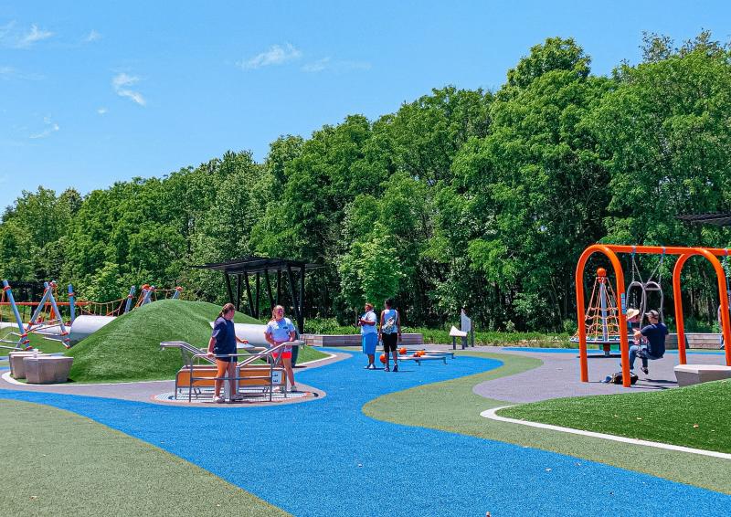 People playing at the Switchyard Park playground