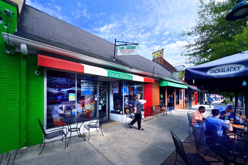 People dining and getting takeout at Italian Pizzeria III in Chapel Hill