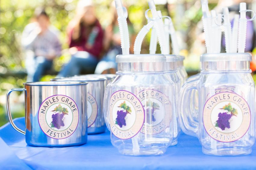 plastic cups with straws with Naples Grape Festival logo
