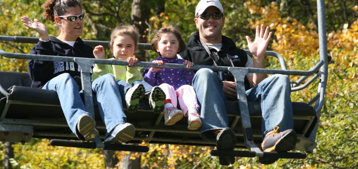 Family on Fall Sky Rides