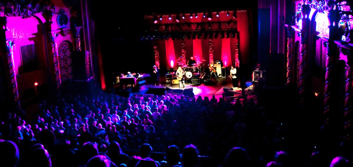 The audience watches a band perform at the Smith Opera House in Geneva, NY