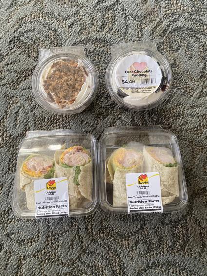 club wraps and pudding from a travel stop