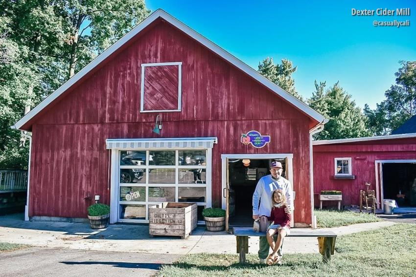 Father and daughter at Dexter Cider Mill