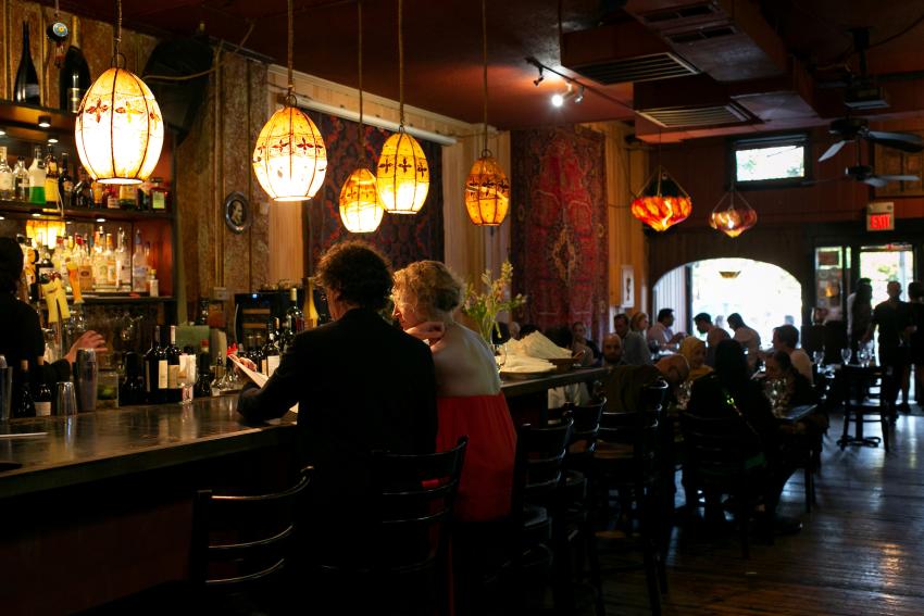 Couple Sitting at Bar in Talulla's Restaurant