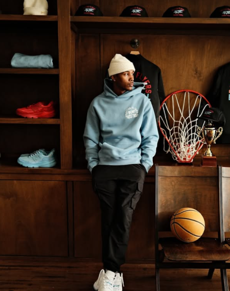 Man posing in Dayton Flyers hoodie from Ransom Supply in Columbus