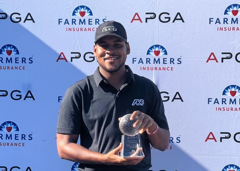 Marcus Byrd displays his APGA Tour Valley Forge trophy after winning the second annual championship Wednesday at Bluestone Country Club in Blue Bell, Montgomery County, PA.(Photo credit: APGA Tour)