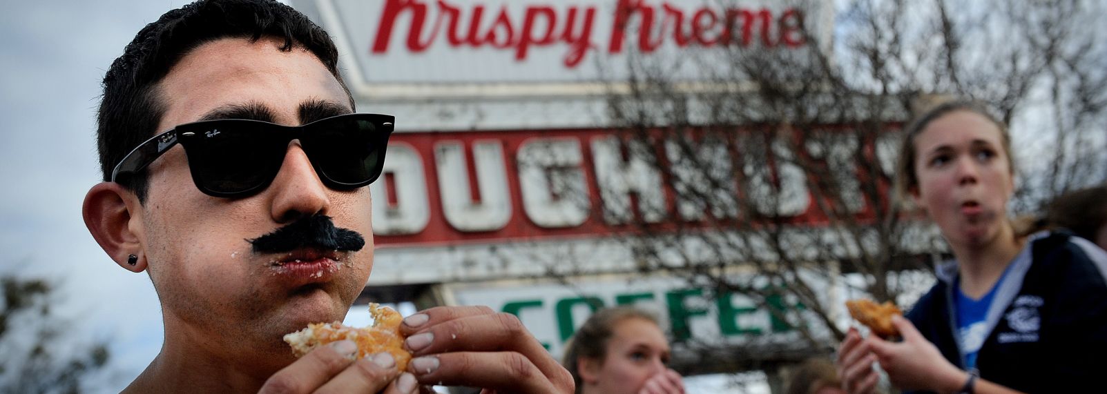 Doughnut diehards line up outside Alaska's first-ever Krispy Kreme -  Anchorage Daily News