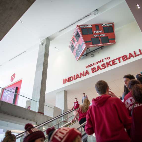 People riding the escalator to the second floor of Assembly Hall