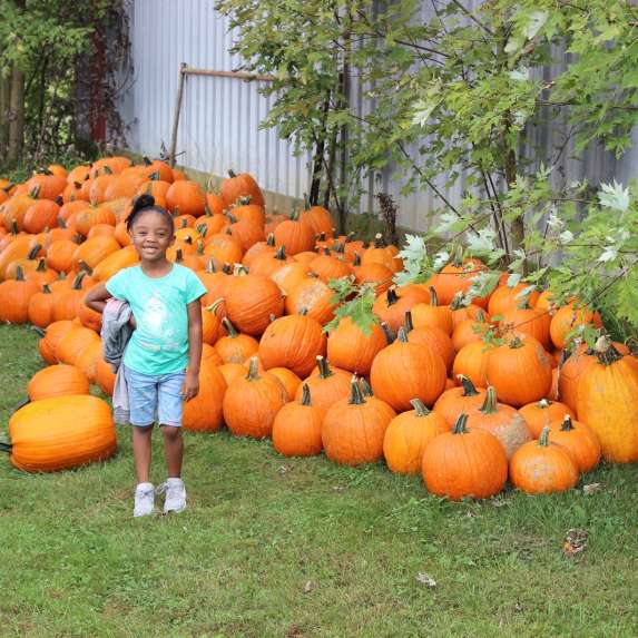 Child at pumpkin patch