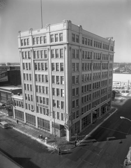 Bellin Building Archive. Drone shot of a tall building with lots of windows.