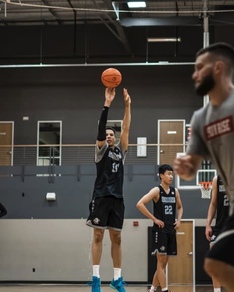 A player with Sunrise Christian Academy jumps to make a shot during a game