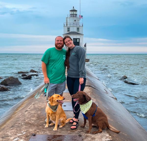 That Wisconsin Couple on at the Manitowoc Lighthouse with two dogs