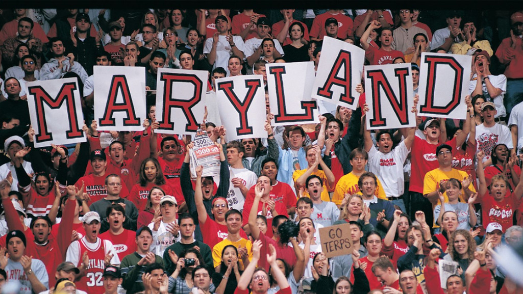 Maryland football fans hold up a spelling of the state name