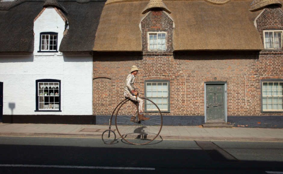 A man riding a Penny Farthing through Lincolnshire Wolds
