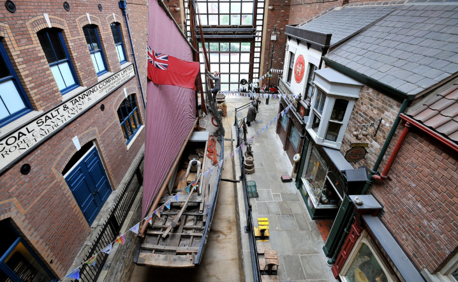 sculpture of a boat and different buildings within the Fishing Heritage Centre at Grimsby