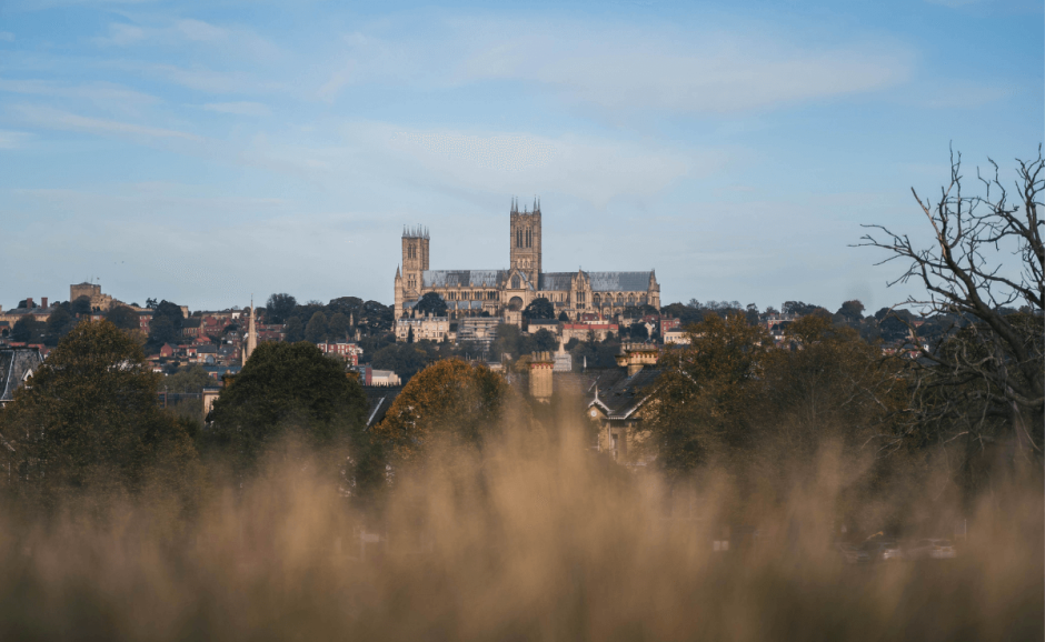 A view of an old church from a distant field in Lincoln