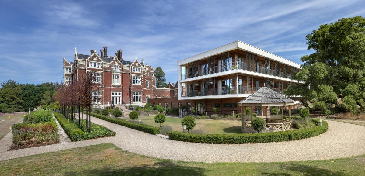External view of Wivenhoe House Hotel showing the old and new building