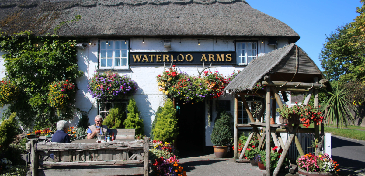 The Waterloo Arms Pub in the summer with people outside