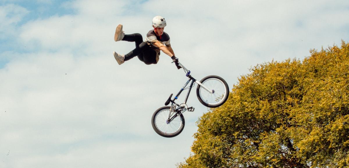 A BMX biker pulls off an aerial trick at Southsea Skatepark during the Victorious Festival