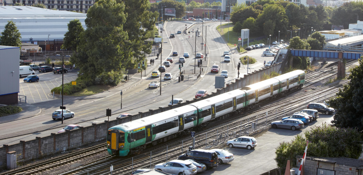 Birds eye view of train pulling out of Southampton Central Train station