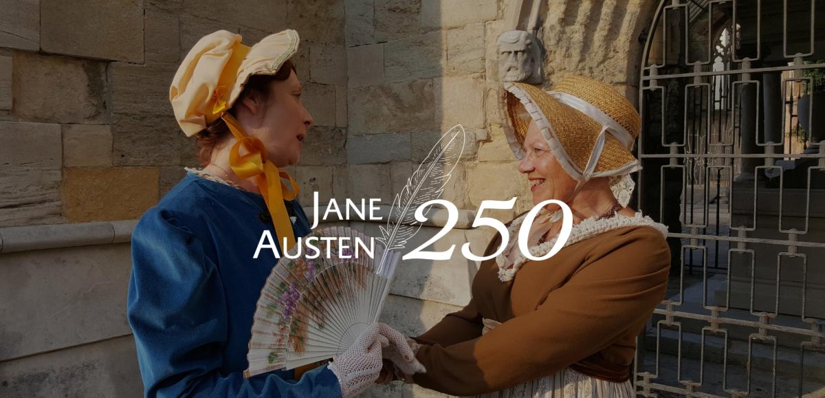 Two women dressed in period pieces in celebration of Jane Austen 250