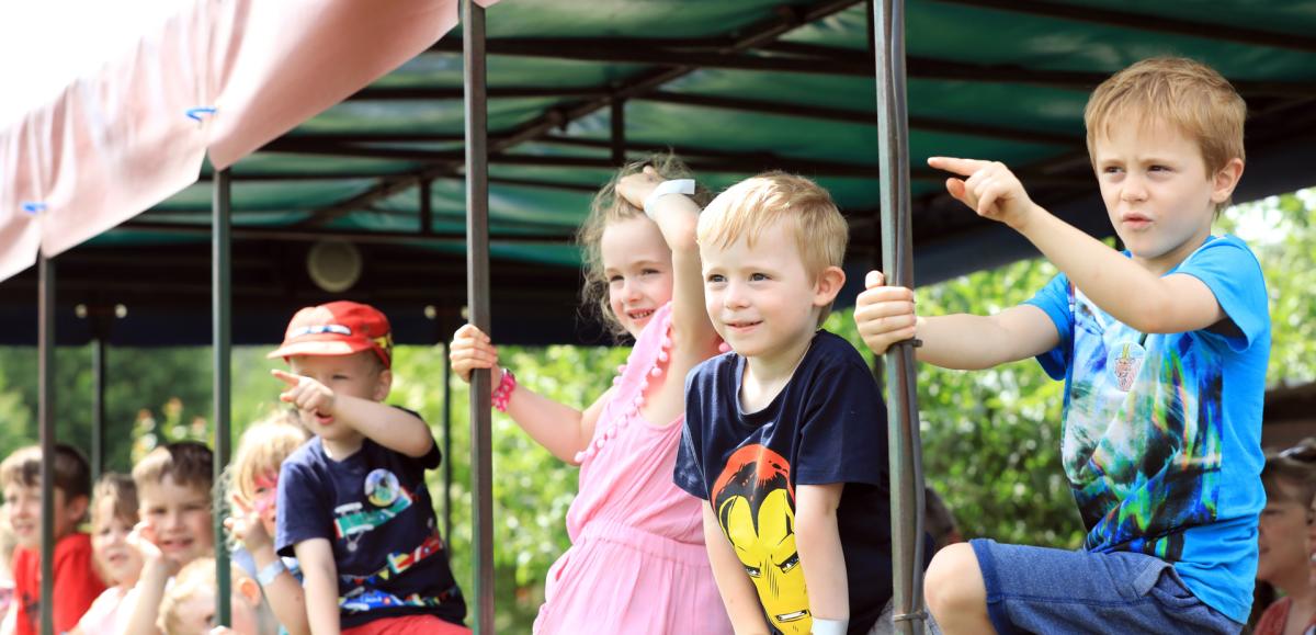 Children enjoying a trailer tractor ride at Bocketts Farm