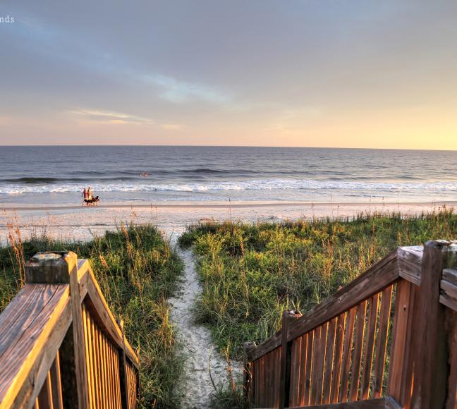 Walkway to a sandy path leading to Holden Beach