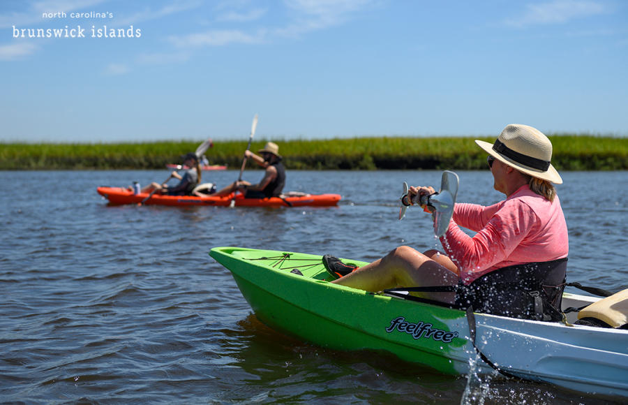 woman paddling kayak