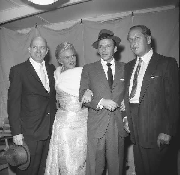 The ninth annual Police Show on March 29, 1958, From left, Jimmy Van Heusen, Peggy Lee, Sinatra, and Ray Ryan.