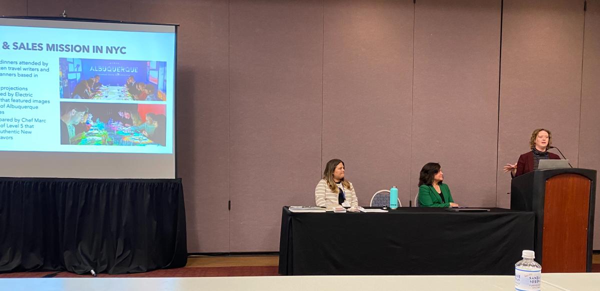 Brenna Moore presents during a presentation at the Governor's Conference
