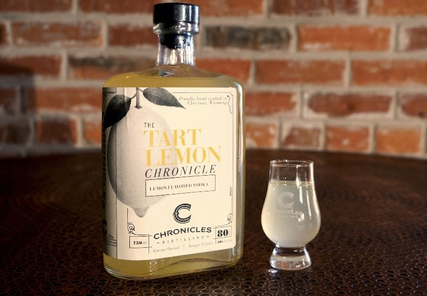 Chronicles Distilling's Tart Lemon Chronicle vodka bottle on display in Cheyenne, a perfect base for refreshing summer drinks.