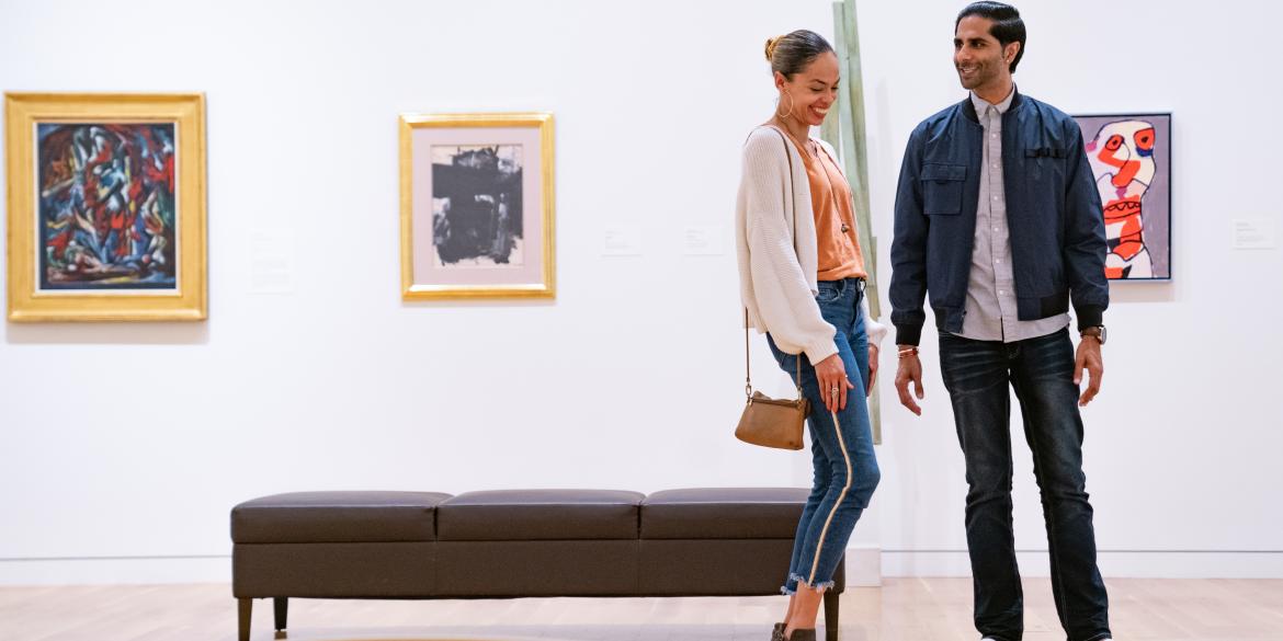 A couple exploring the Columbus Museum of Art.