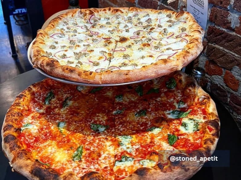 Two stacked pizzas