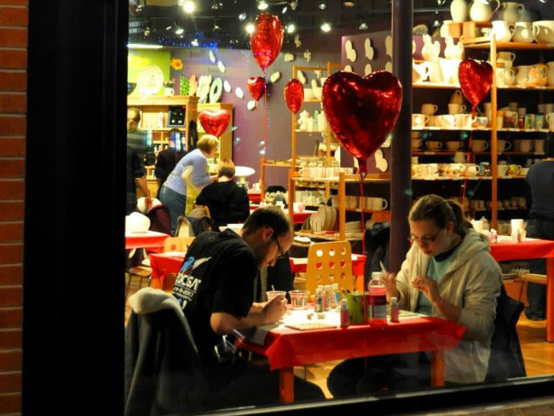 People doing a Valentine's craft at Crackpots