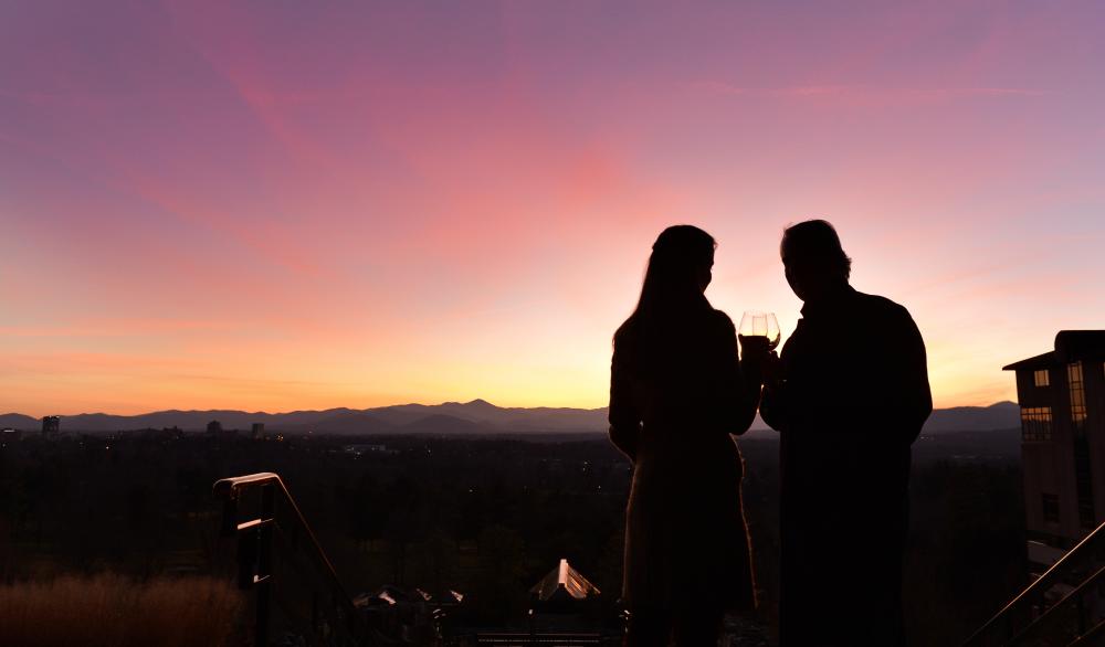 Couple at Sunset Terrace at the Omni Grove Park Inn