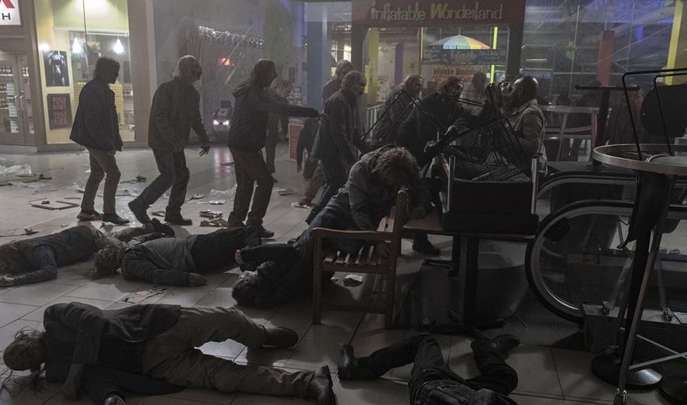 Fear the Walking Dead screengrab showing zombies walking through the inside of Bridgeview Mall