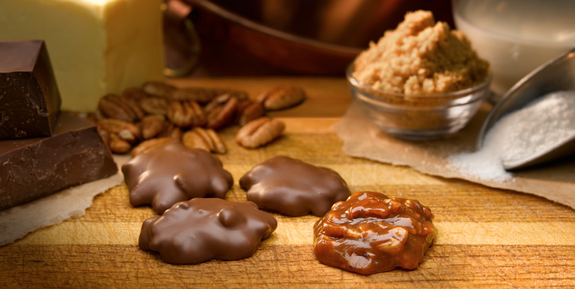 Image of chocolate covered candies sitting on a table.