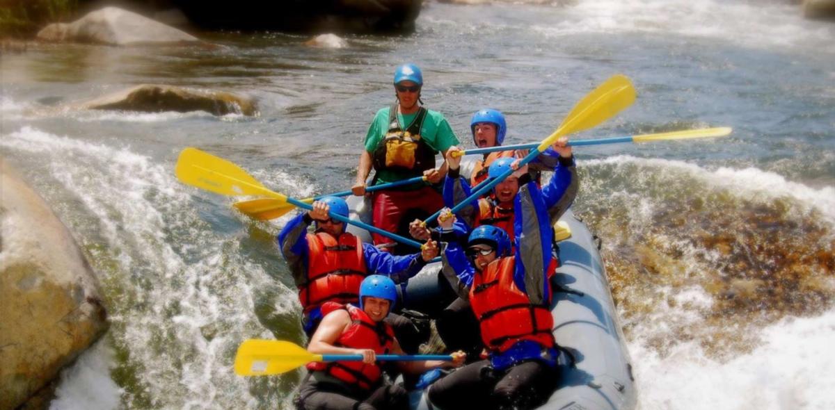 Rafting Group Going Over Cascade