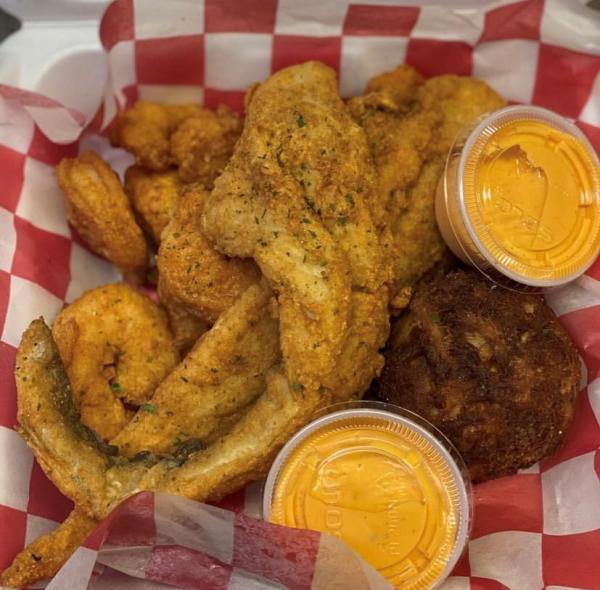 Fried Seafood And Sauce From Crabby Cali's In Virginia Beach, VA
