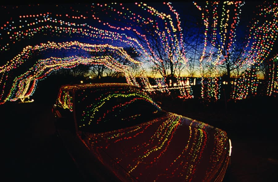 car under winter wonderland lights