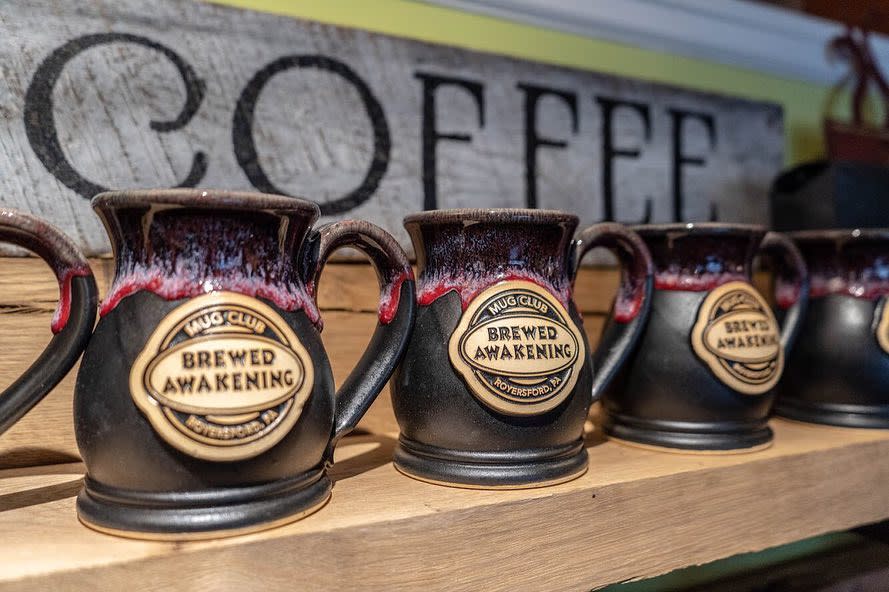 Mugs lined up at brewed awakening