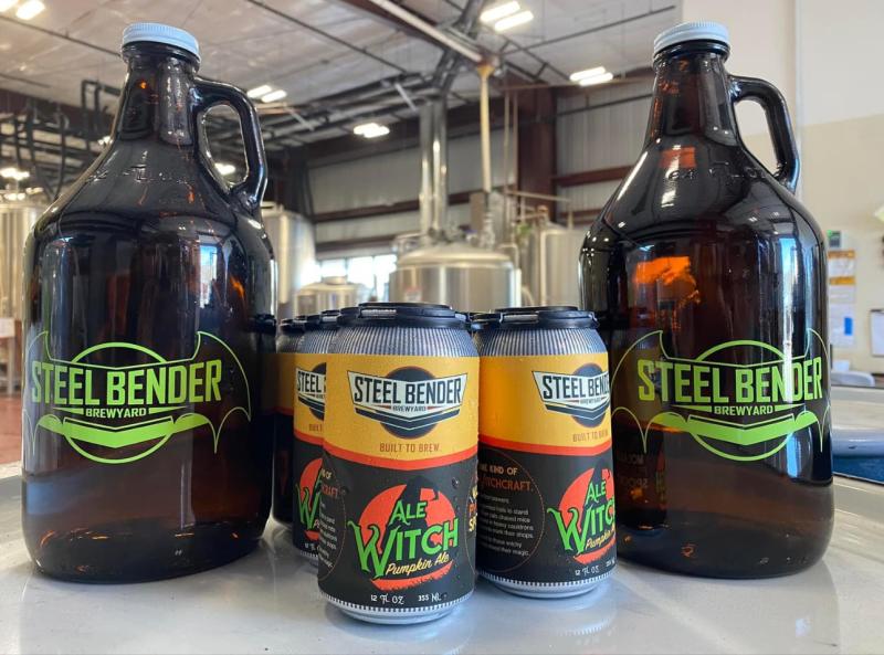 A couple cans and jugs of Ale Witch beer from Steel Bender Brewyard.
