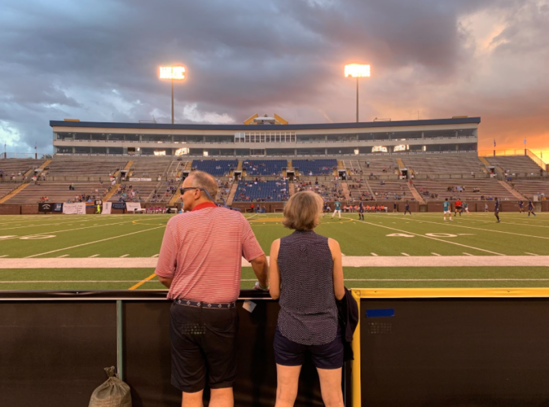 Jay and Hope Schaffer watch a game at Finley Stadium