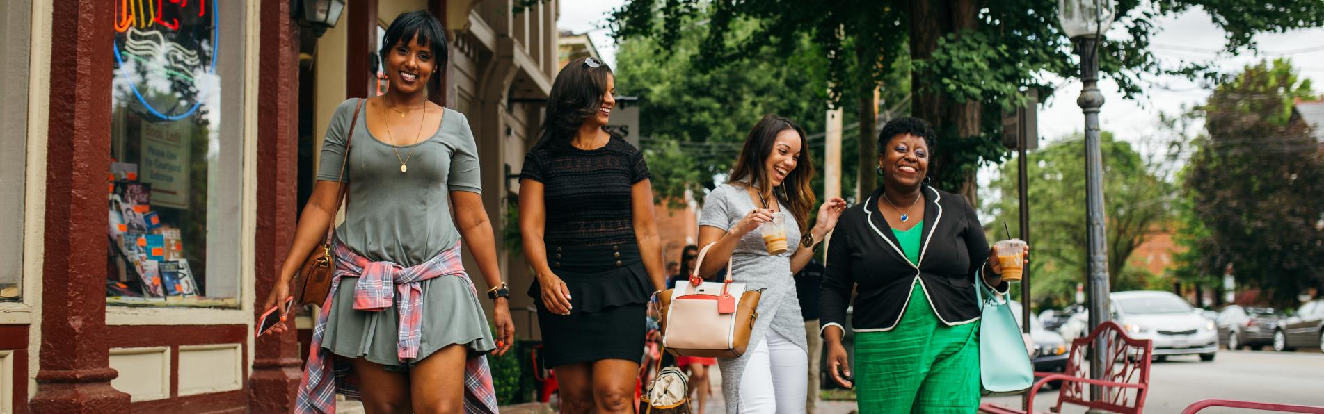 Four women walking in front of Book Loft in German Village
