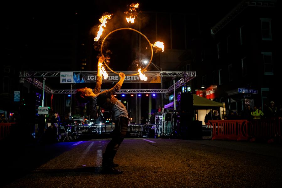 person dancing with fire