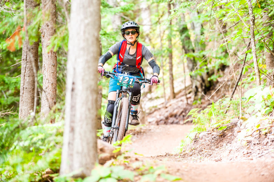 Woman on Copper Harbor singletrack trail