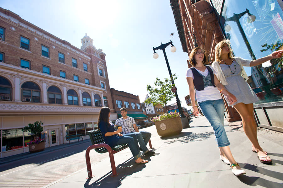 Two women shopping in downtown Houghton