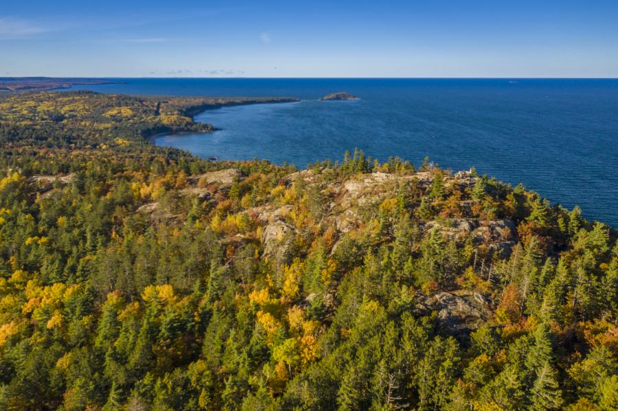 Aerial view of Sugarloaf Mountain with fall foliage and Lake Superior in Marquette, MI