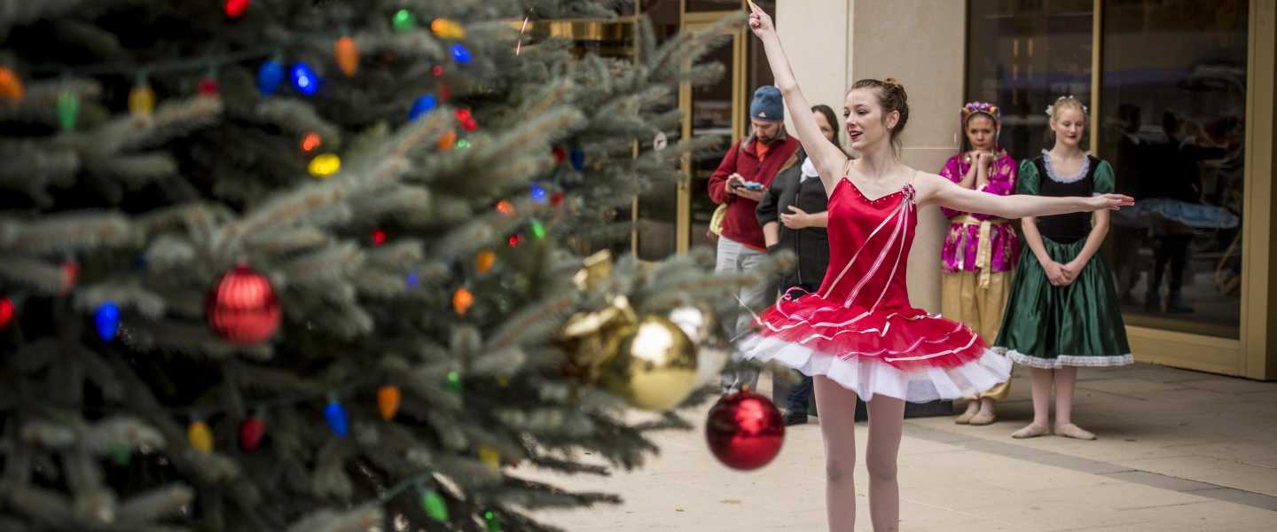 Ballet Midwest dancer with Christmas Tree